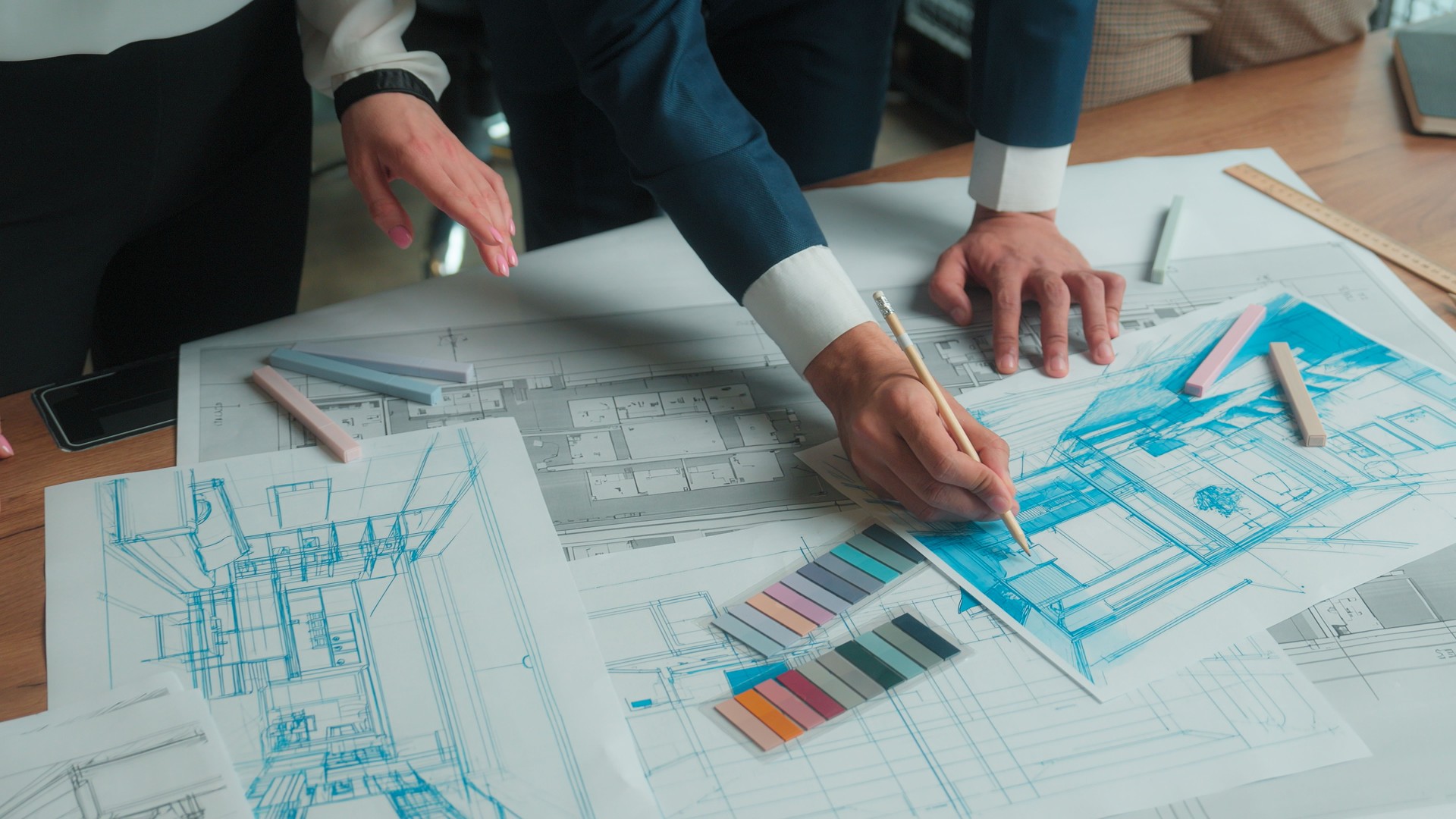 Architecture design project Arabian man architect designer engineer muslim women in hijab talk discuss office interior drawing building floor plan drafting blueprint on paper business team colleagues